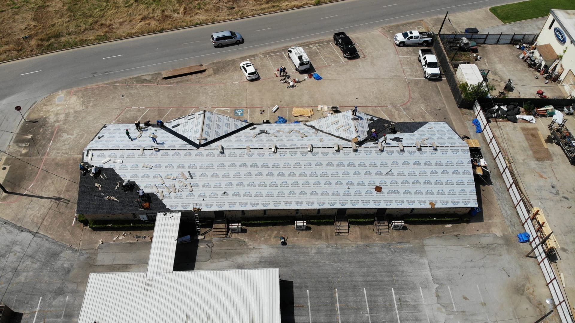 Low-slope commercial roof mid-installation
