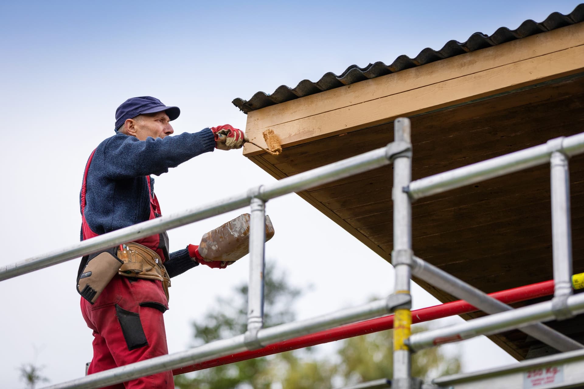 Man doing exterior painting